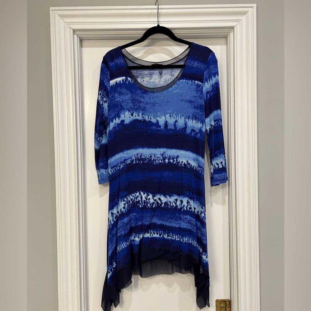 Cupid blue shirt with asymmetrical hem. Size L. Gently used.